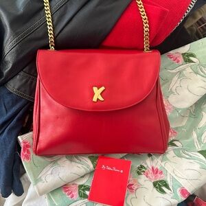 Paloma Picasso crossbody gold chain , purse never used , beautiful